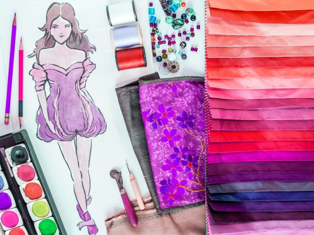 fashion designer reviewing pricing and collection planning