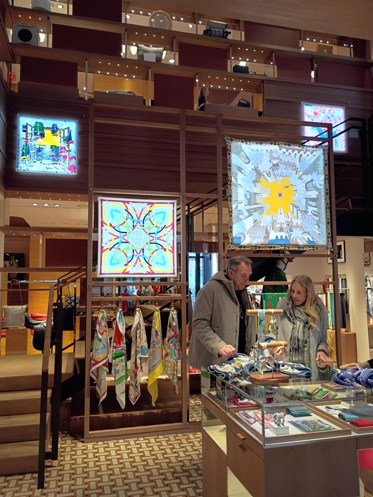 Interior view of the Hermès Meatpacking boutique featuring luxury fashion merchandising and retail displays